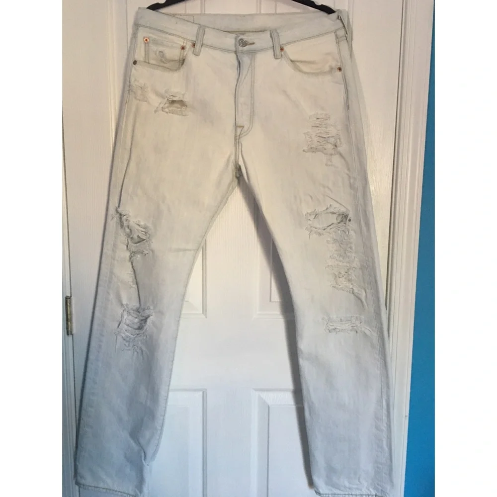 Levi’s 501 light(white) washed ripped jeans